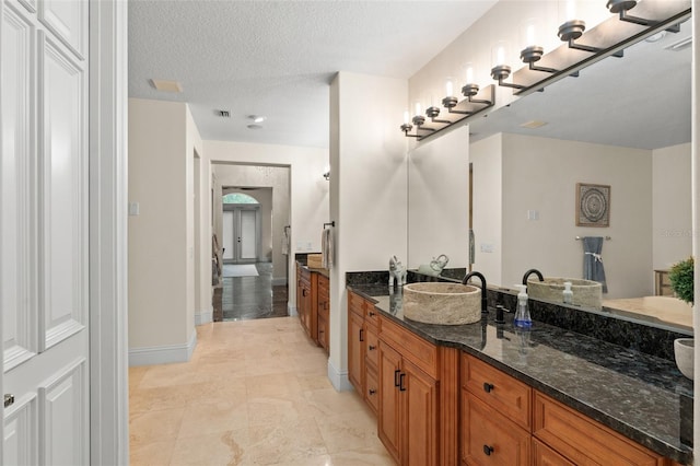 3426 Cocard Ct, Windermere, FL 34786 - full bath featuring vanity and a textured ceiling