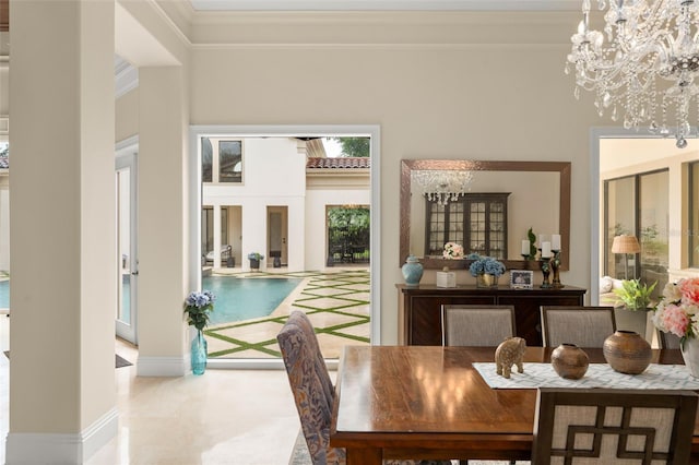 3426 Cocard Ct, Windermere, FL 34786 - dining space featuring a chandelier and crown molding