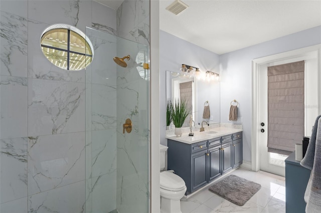 3426 Cocard Ct, Windermere, FL 34786 - full bathroom featuring marble finish floors, vanity, and a marble finish shower