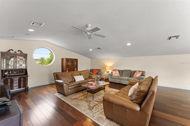 3426 Cocard Ct, Windermere, FL 34786 - living area with vaulted ceiling, ceiling fan, dark wood-style floors, recessed lighting, and a textured ceiling