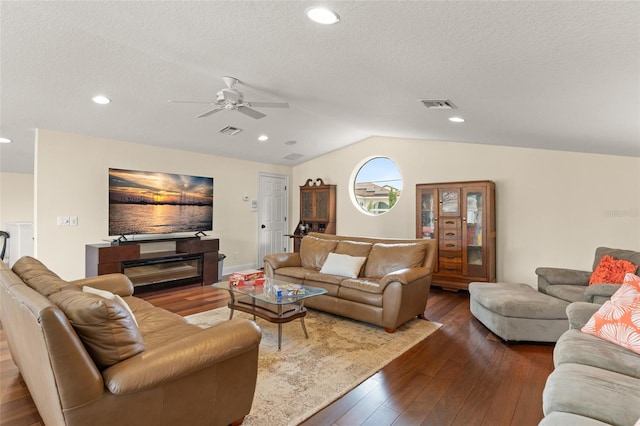3426 Cocard Ct, Windermere, FL 34786 - living area featuring lofted ceiling, a ceiling fan, dark wood-style flooring, recessed lighting, and a textured ceiling