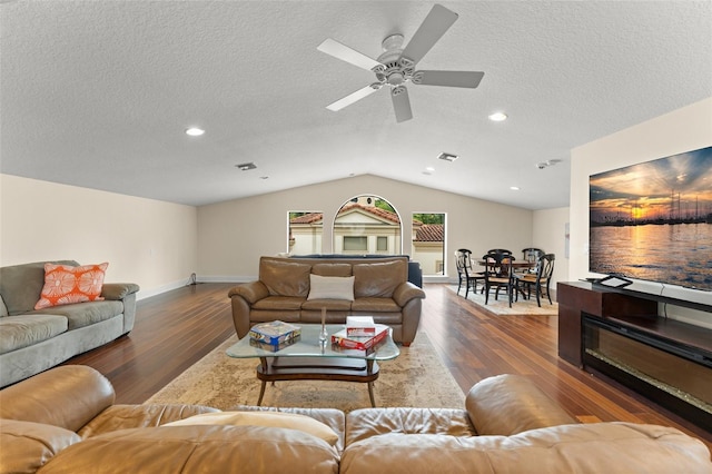 3426 Cocard Ct, Windermere, FL 34786 - living area with wood finished floors, vaulted ceiling, ceiling fan, a textured ceiling, and recessed lighting