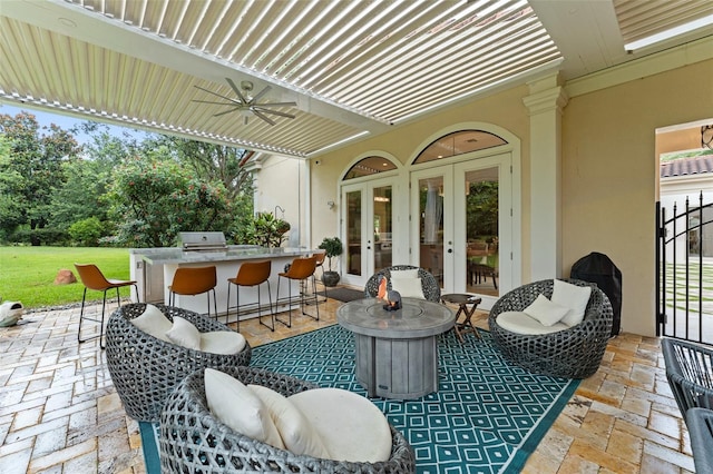 3426 Cocard Ct, Windermere, FL 34786 - view of patio / terrace featuring french doors, an outdoor bar, ceiling fan, and grilling area