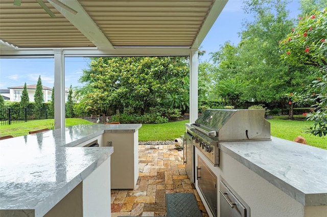 3426 Cocard Ct, Windermere, FL 34786 - view of patio featuring exterior kitchen