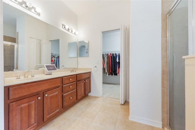 2782 Cedar Knoll Dr, Apopka, FL 32712 - full bathroom with a walk in closet, tile patterned flooring, double vanity, and a shower stall