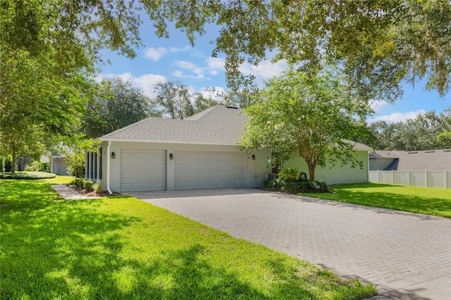2782 Cedar Knoll Dr, Apopka, FL 32712 - view of front facade featuring decorative driveway, an attached garage, and stucco siding