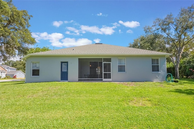 2782 Cedar Knoll Dr, Apopka, FL 32712 - back of property featuring stucco siding, a yard, and a sunroom