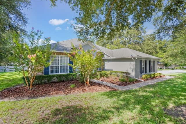 2782 Cedar Knoll Dr, Apopka, FL 32712 - view of home's exterior featuring a lawn