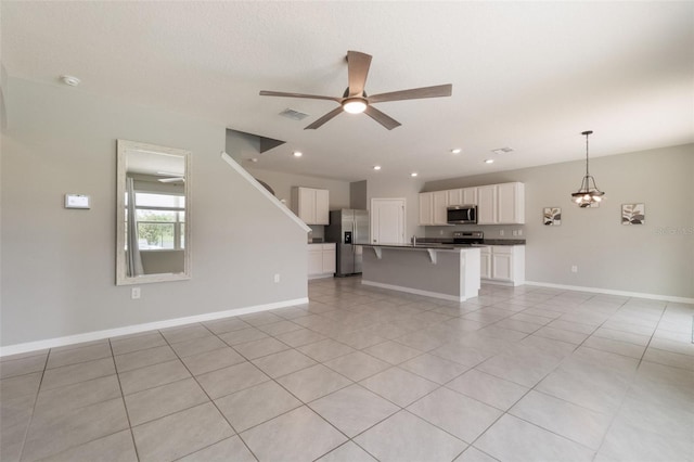6808 Cranes Roost Rd, Harmony, FL 34773 - unfurnished living room with a ceiling fan, light tile patterned floors, and recessed lighting