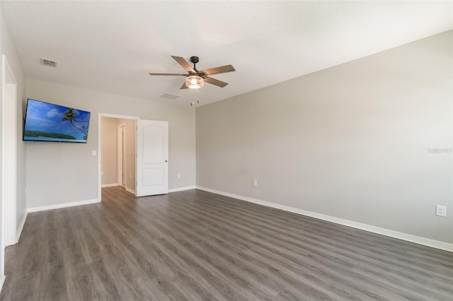 6808 Cranes Roost Rd, Harmony, FL 34773 - empty room featuring dark wood-type flooring and a ceiling fan