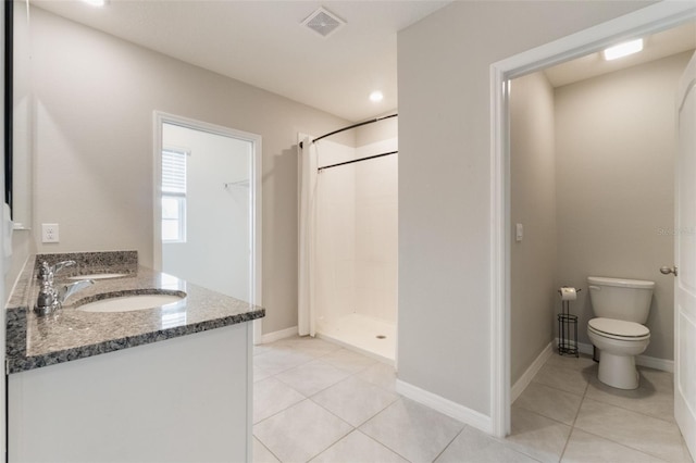 6808 Cranes Roost Rd, Harmony, FL 34773 - full bath featuring a stall shower, tile patterned floors, double vanity, and recessed lighting