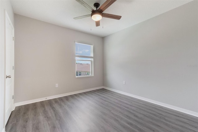 6808 Cranes Roost Rd, Harmony, FL 34773 - empty room with dark wood-style floors and a ceiling fan