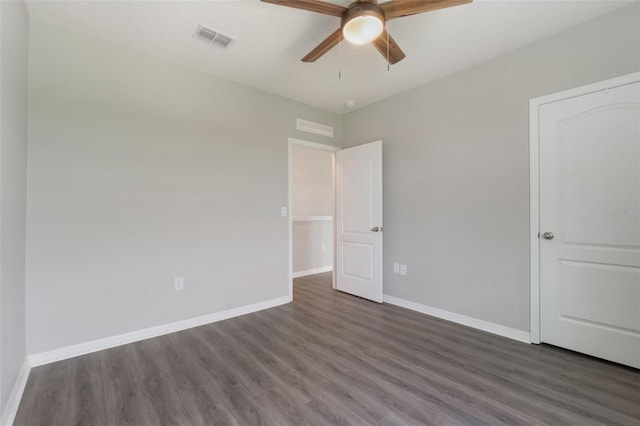 6808 Cranes Roost Rd, Harmony, FL 34773 - unfurnished bedroom with wood finished floors and ceiling fan