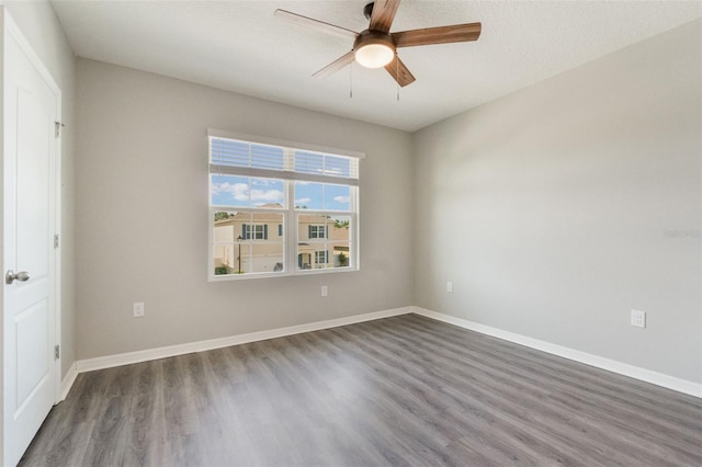 6808 Cranes Roost Rd, Harmony, FL 34773 - empty room with wood finished floors and a ceiling fan
