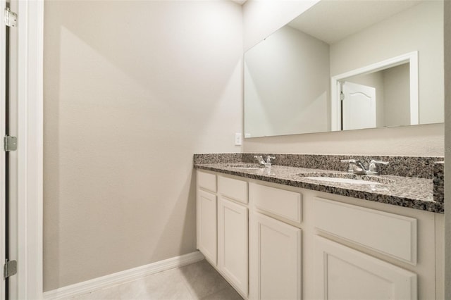 6808 Cranes Roost Rd, Harmony, FL 34773 - bathroom with double vanity and tile patterned flooring