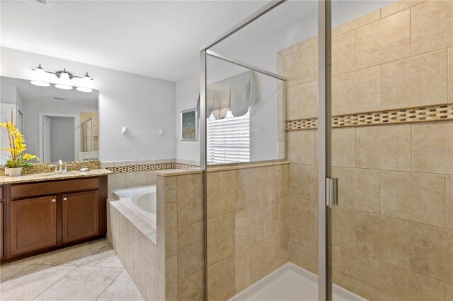 9023 Shadow Mountain St, Davenport, FL 33896 - full bath featuring a shower stall, a bath, vanity, and tile patterned floors