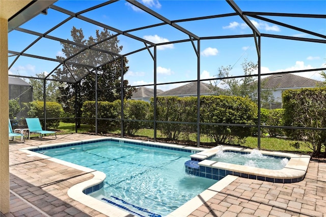 9023 Shadow Mountain St, Davenport, FL 33896 - view of swimming pool featuring a pool with connected hot tub, a patio area, and glass enclosure