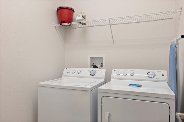 9023 Shadow Mountain St, Davenport, FL 33896 - laundry room with washer and clothes dryer