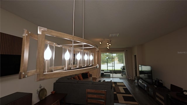 4858 Magnetite Loop, Mount Dora, FL 32757 - living area featuring wood finished floors