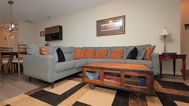 4858 Magnetite Loop, Mount Dora, FL 32757 - living area featuring wood finished floors