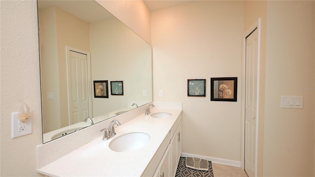 4858 Magnetite Loop, Mount Dora, FL 32757 - bathroom with double vanity, tile patterned flooring, and a closet