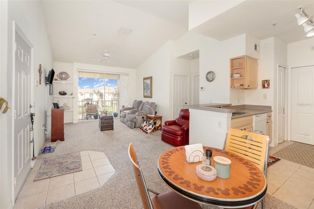 1125 Lake Shadow Cir Unit 5308, Maitland, FL 32751 - dining space with light tile patterned flooring, a ceiling fan, light colored carpet, and high vaulted ceiling