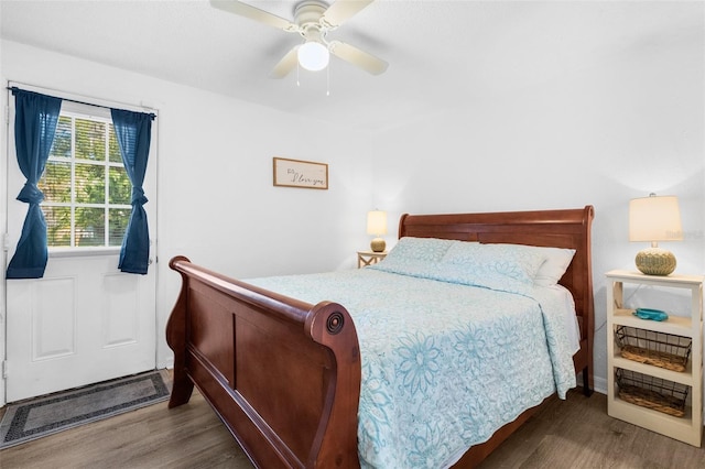 5141 Mallet Dr, Port Richey, FL 34668 - bedroom with wood finished floors and ceiling fan