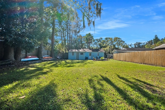 5141 Mallet Dr, Port Richey, FL 34668 - fenced backyard with an outdoor structure