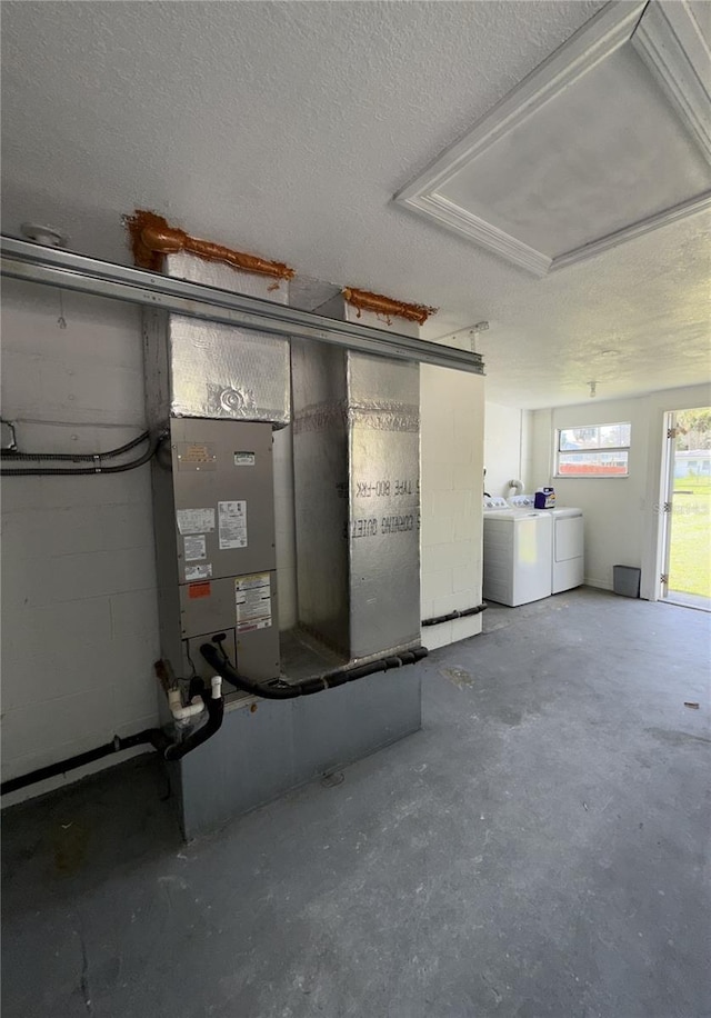 5141 Mallet Dr, Port Richey, FL 34668 - garage with washing machine and clothes dryer