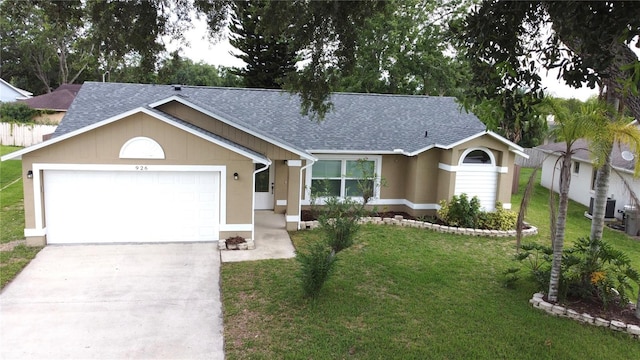 926 Freshmeadow Ct, Apopka, FL 32703 - ranch-style home with a shingled roof, a garage, a front yard, driveway, and stucco siding