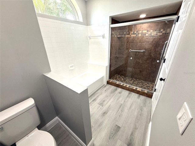 926 Freshmeadow Ct, Apopka, FL 32703 - bathroom featuring a stall shower, wood finished floors, and a bath