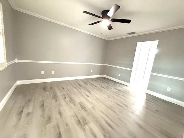 926 Freshmeadow Ct, Apopka, FL 32703 - unfurnished room with ceiling fan, wood finished floors, and crown molding