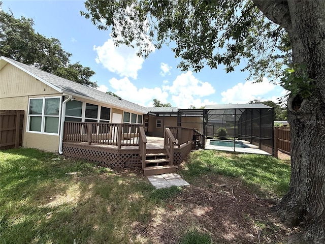 926 Freshmeadow Ct, Apopka, FL 32703 - rear view of house featuring a deck, a fenced backyard, glass enclosure, and a shingled roof