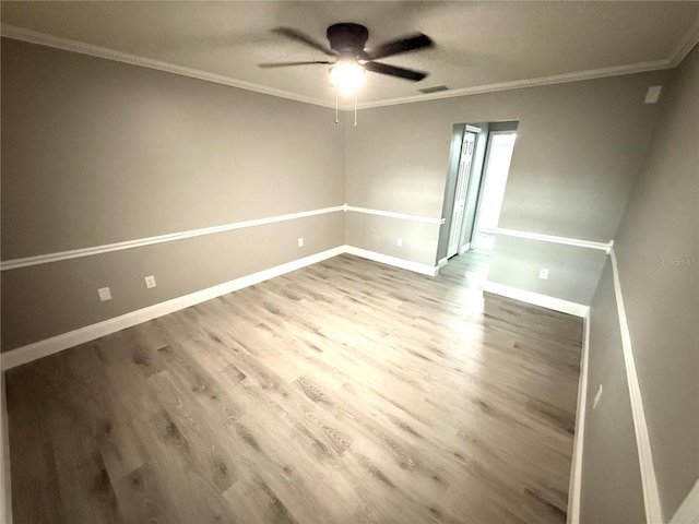 926 Freshmeadow Ct, Apopka, FL 32703 - spare room featuring ceiling fan, wood finished floors, and ornamental molding