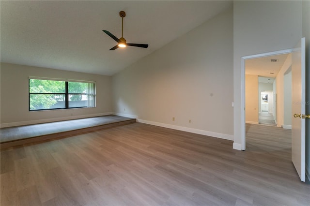 6019 Crystal View Dr, Orlando, FL 32819 - unfurnished room with a ceiling fan, high vaulted ceiling, and wood finished floors