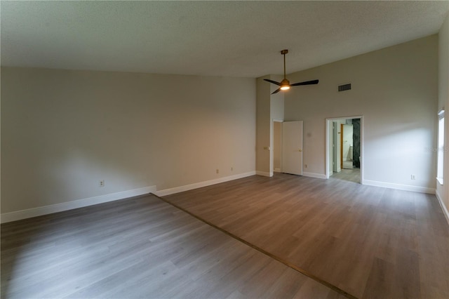 6019 Crystal View Dr, Orlando, FL 32819 - unfurnished room with ceiling fan, wood finished floors, and high vaulted ceiling
