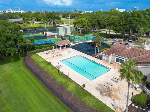 6019 Crystal View Dr, Orlando, FL 32819 - community pool with view of scattered trees