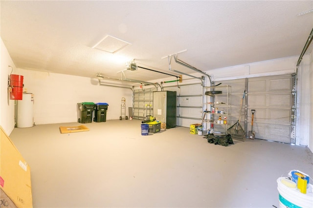 6019 Crystal View Dr, Orlando, FL 32819 - garage featuring a garage door opener and a central vacuum unit