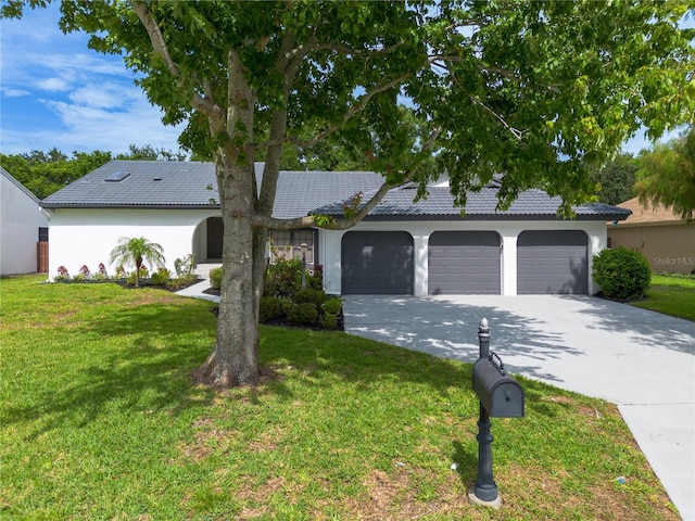 6019 Crystal View Dr, Orlando, FL 32819 - ranch-style home featuring a garage, driveway, stucco siding, and a front lawn