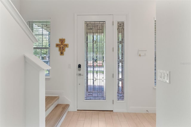 15448 Murcott Blossom Blvd, Winter Garden, FL 34787 - foyer entrance with baseboards and stairway
