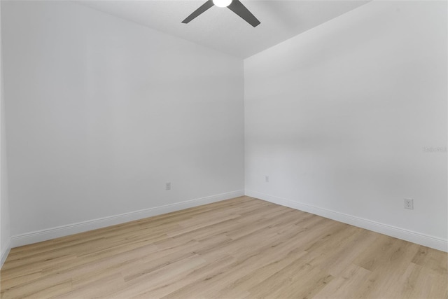 15448 Murcott Blossom Blvd, Winter Garden, FL 34787 - empty room featuring ceiling fan, vaulted ceiling, and light wood-style flooring