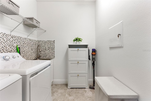 15448 Murcott Blossom Blvd, Winter Garden, FL 34787 - laundry area featuring separate washer and dryer and cabinet space