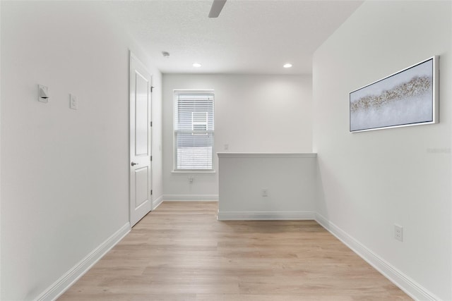 15448 Murcott Blossom Blvd, Winter Garden, FL 34787 - unfurnished room featuring light wood-type flooring, ceiling fan, and recessed lighting