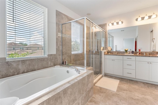 15448 Murcott Blossom Blvd, Winter Garden, FL 34787 - full bathroom with double vanity, a bath, and a stall shower