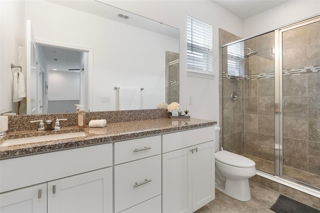 15448 Murcott Blossom Blvd, Winter Garden, FL 34787 - bathroom featuring vanity, a stall shower, and tile patterned floors