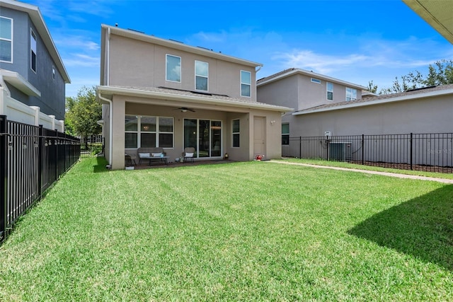 15448 Murcott Blossom Blvd, Winter Garden, FL 34787 - back of house featuring stucco siding, ceiling fan, a fenced backyard, and an outdoor hangout area
