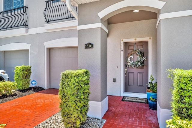 1191 Honey Blossom Dr Unit D, Orlando, FL 32824 - property entrance featuring stucco siding and a garage