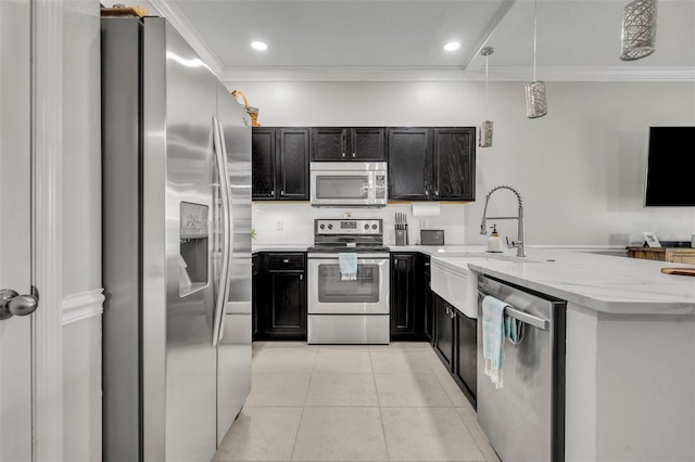 1191 Honey Blossom Dr Unit D, Orlando, FL 32824 - kitchen featuring appliances with stainless steel finishes, dark cabinetry, ornamental molding, light tile patterned flooring, and light stone countertops