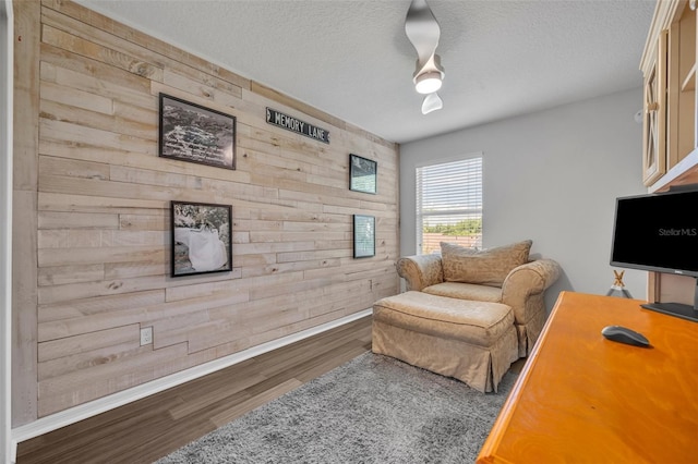 1191 Honey Blossom Dr Unit D, Orlando, FL 32824 - office with wood walls, wood finished floors, and a textured ceiling