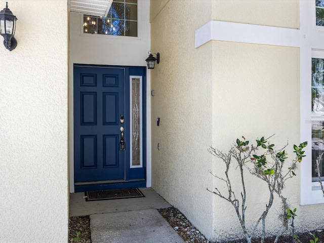 1111 Liberty Hall Dr, Kissimmee, FL 34746 - entrance to property featuring stucco siding